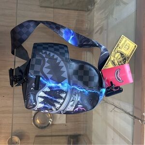 Sprayground Gold Card Design with Red Tag